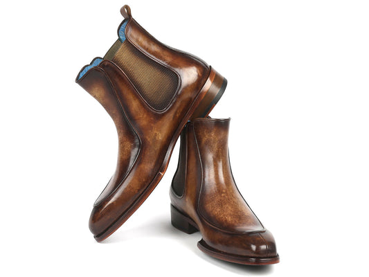 The Paul Parkman Men's Brown Handpainted Chelsea Boots Goodyear Welted - BT822BRW are meticulously crafted from hand-painted leather with a polished finish, featuring elastic side panels and a low heel.