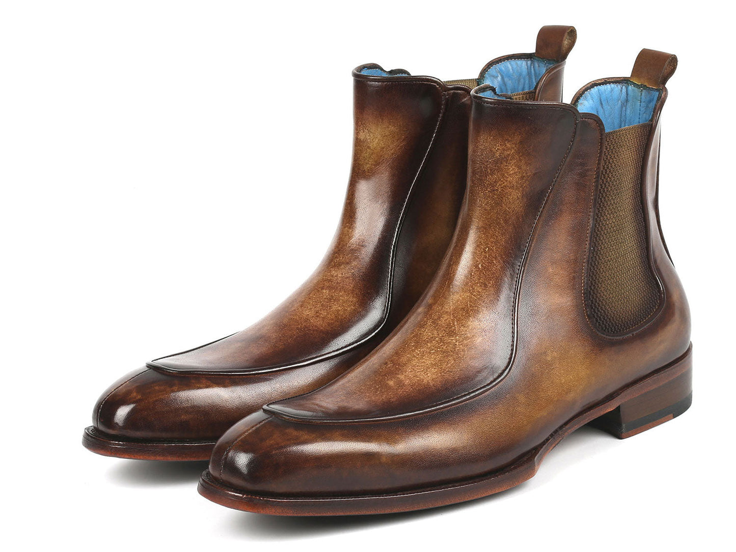 The Paul Parkman Men's Brown Handpainted Chelsea Boots Goodyear Welted - BT822BRW are meticulously crafted from hand-painted leather with a polished finish, featuring elastic side panels and a low heel.