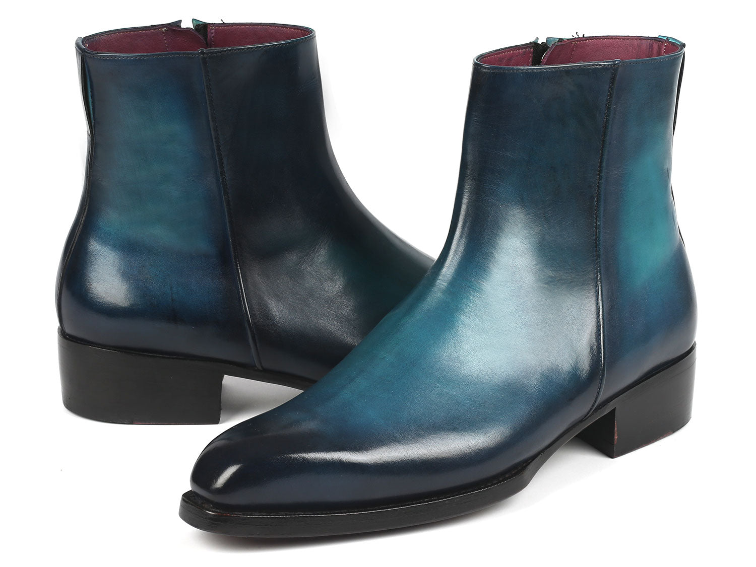 Paul Parkman Blue Burnished Side Zipper Boots, model BT3955-BLU, feature a Goodyear welted construction with polished blue leather and black soles. One boot is displayed upright while the other rests on its side for a detailed view.