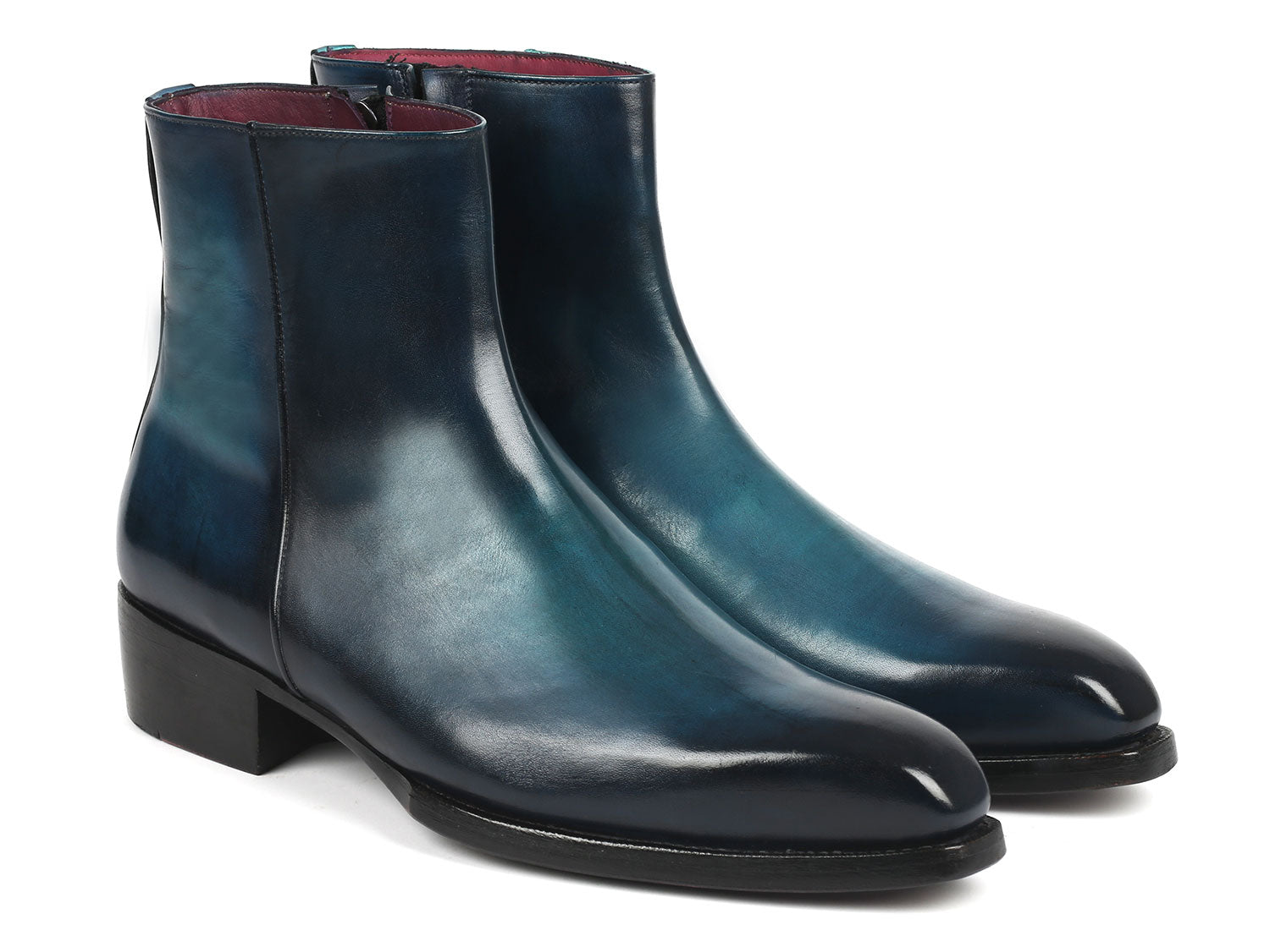 Paul Parkman Blue Burnished Side Zipper Boots, model BT3955-BLU, feature a Goodyear welted construction with polished blue leather and black soles. One boot is displayed upright while the other rests on its side for a detailed view.