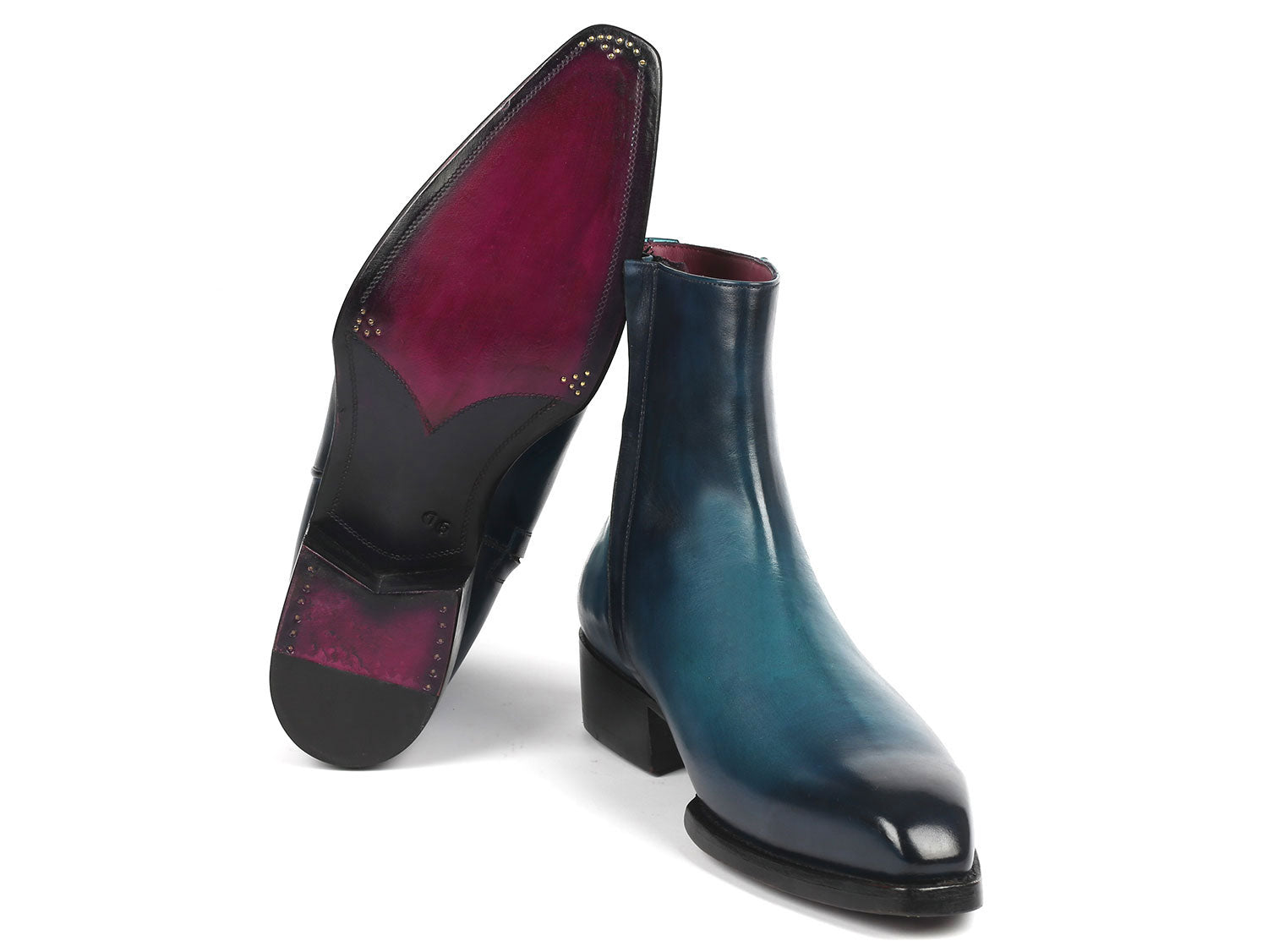 Paul Parkman Blue Burnished Side Zipper Boots, model BT3955-BLU, feature a Goodyear welted construction with polished blue leather and black soles. One boot is displayed upright while the other rests on its side for a detailed view.