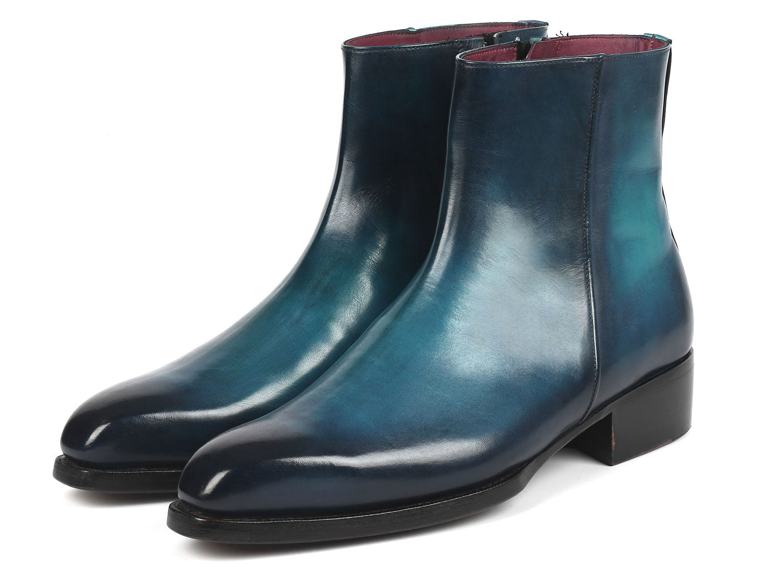 Paul Parkman Blue Burnished Side Zipper Boots, model BT3955-BLU, feature a Goodyear welted construction with polished blue leather and black soles. One boot is displayed upright while the other rests on its side for a detailed view.