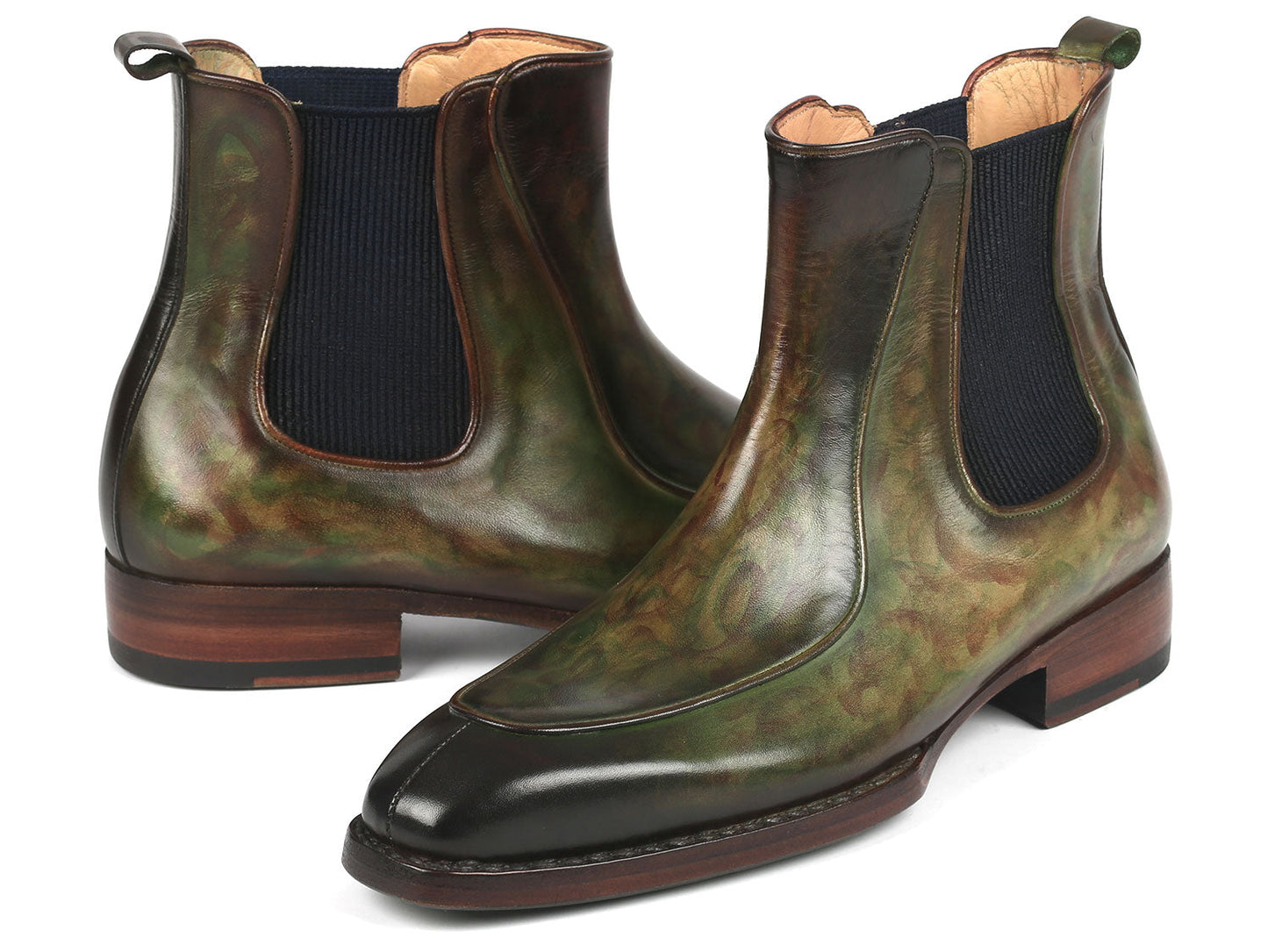 The Paul Parkman Men's Green Handpainted Chelsea Boots, featuring Goodyear welted construction, elastic side panels, and wooden heels, are stylishly displayed with one propped against the other.