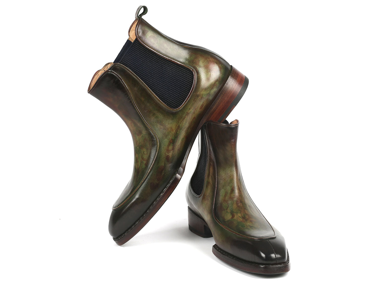 The Paul Parkman Men's Green Handpainted Chelsea Boots, featuring Goodyear welted construction, elastic side panels, and wooden heels, are stylishly displayed with one propped against the other.