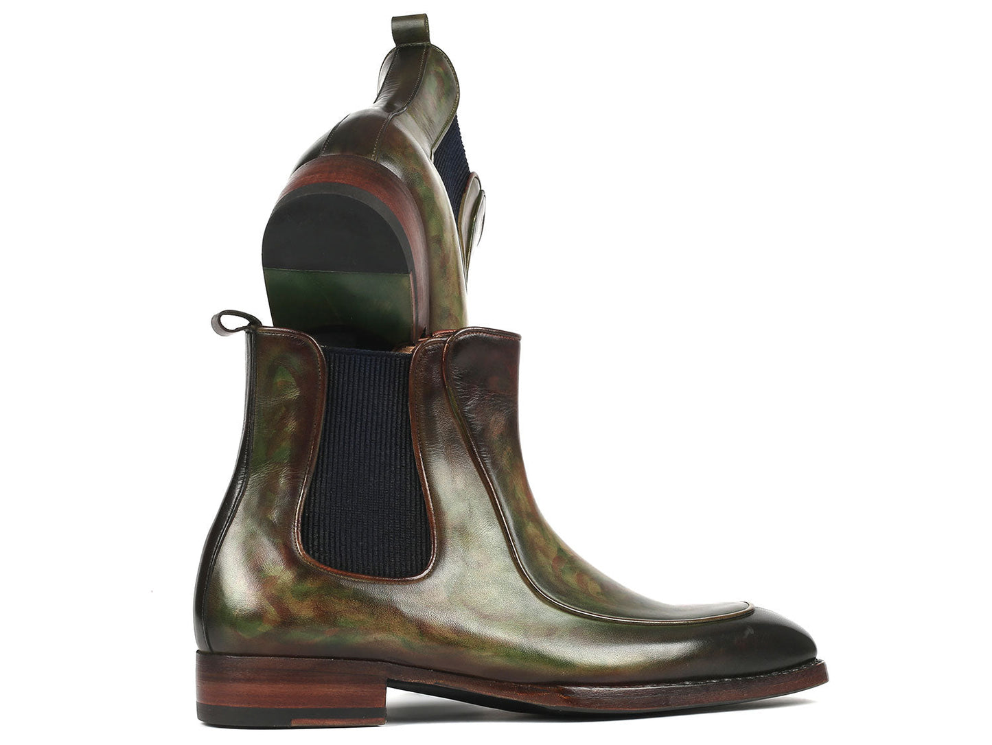 The Paul Parkman Men's Green Handpainted Chelsea Boots, featuring Goodyear welted construction, elastic side panels, and wooden heels, are stylishly displayed with one propped against the other.