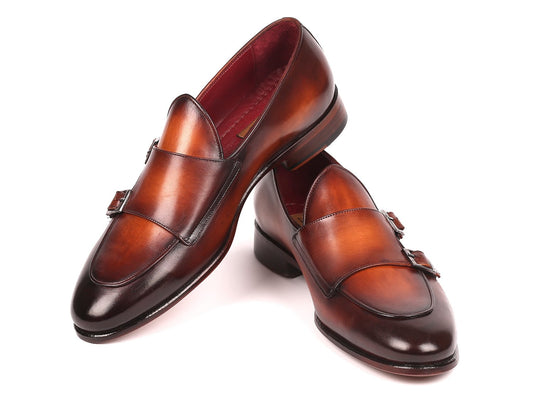 Introducing the Paul Parkman Brown Double Monkstrap Shoes - HT61BRW: These exquisite hand-painted calfskin dress shoes boast a subtle shine and feature decorative buckles along with a striking red interior lining. Designed by Paul Parkman, these double monkstrap shoes exude elegance and sophistication.