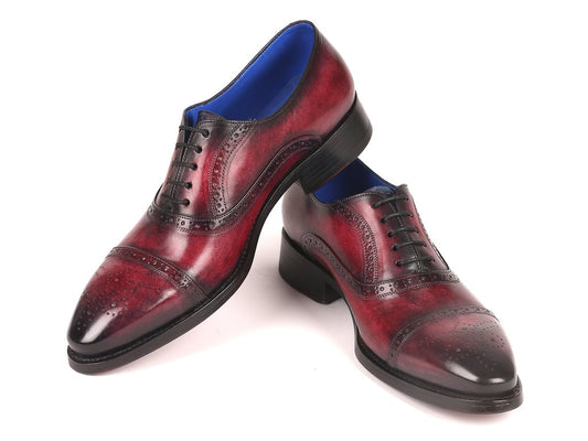 Introducing the Paul Parkman Bordeaux Burnished Goodyear Welted Cap Toe Oxford Shoes - 79BRD68: a pair of exquisitely handmade oxfords crafted in maroon and black polished leather, featuring decorative perforations, blue interiors, and showcasing a sophisticated Goodyear welted construction.