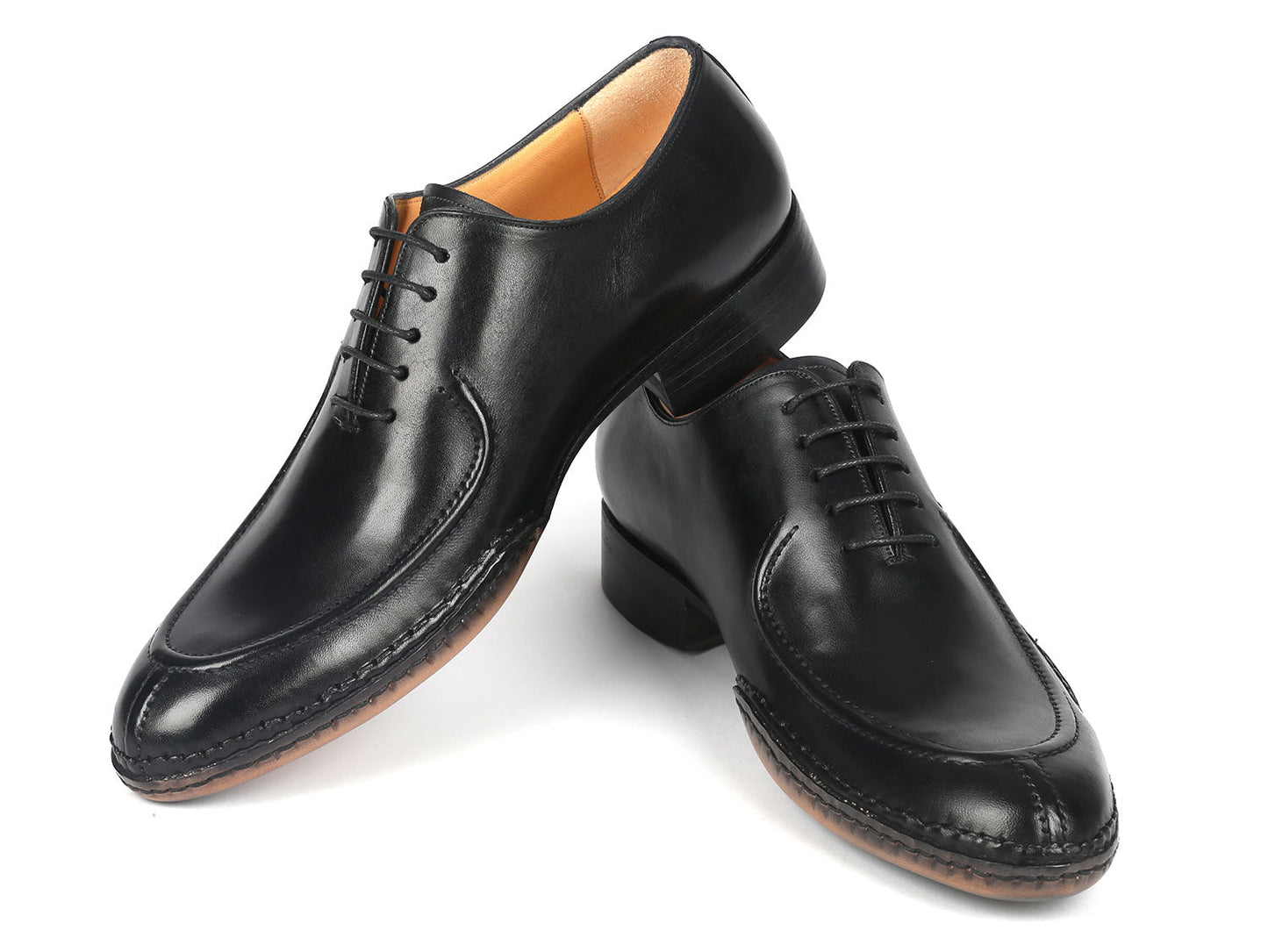 The Paul Parkman Opanka Stitched Men's Split-Toe Black Leather Oxford Shoes - 054-BLK, from the brand Paul Parkman, are crafted from hand-painted black leather and feature elegant laces, displayed against a pristine white background.