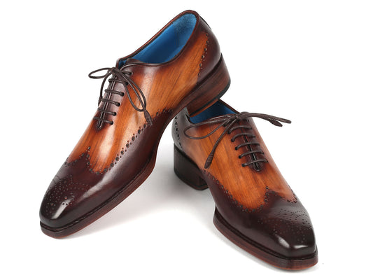 A pair of Paul Parkman Goodyear Welted Two Tone Brown Oxford Shoes - 081-K33, crafted with exquisite brogue detailing and dark laces, displayed on a white background. These handmade shoes by Paul Parkman feature hand-painted leather and Goodyear welted construction, ensuring elegance and durability.