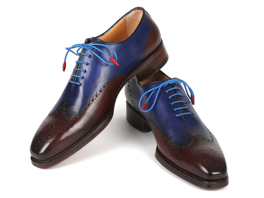 Introducing the Paul Parkman Goodyear Welted Brown & Blue Oxford Shoes - 081-B35, a pair of men's handmade leather shoes featuring perforated detailing. These exquisite brogues come with blue laces and red aglets, meticulously crafted using the renowned Goodyear welted construction for enduring durability.
