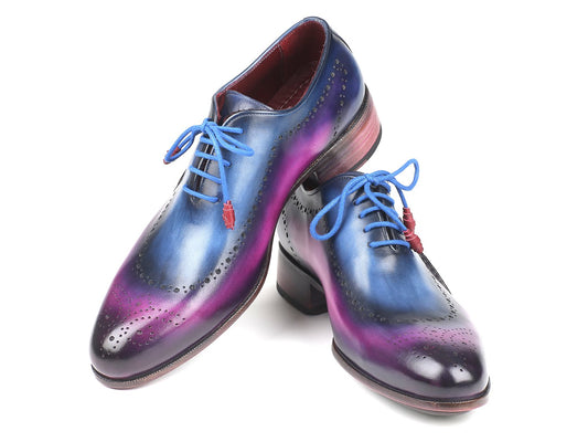 Paul Parkman's Opanka Construction Blue & Purple Oxfords (726-BLU-PUR) are exquisitely hand-painted leather dress shoes, showcasing blue laces and decorative perforations, designed for exceptional durability.