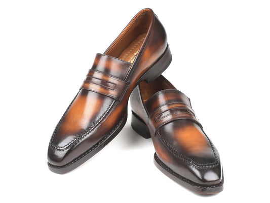 The Paul Parkman Brown Burnished Goodyear Welted Loafers - 36LFBRW feature a sleek design with polished brown leather and dual stitching on the upper, highlighting the Goodyear welted construction against a white background.
