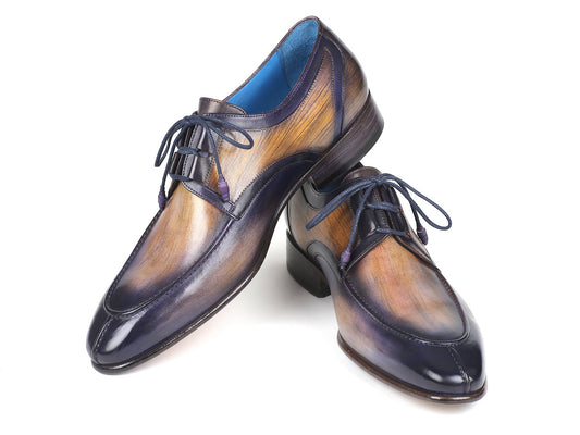 A pair of Paul Parkman dress shoes, model GU566PRP, is crafted with hand-painted leather transitioning from camel to purple, featuring ghillie lacing and a low heel.