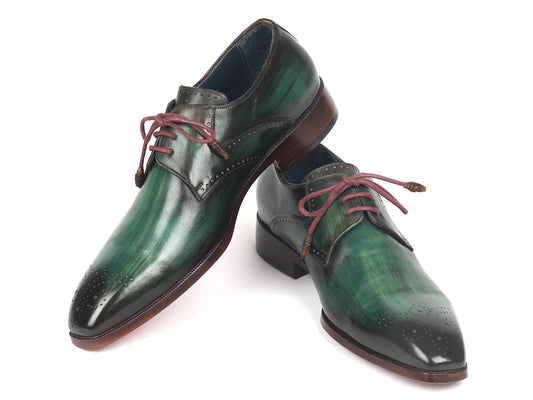 The Paul Parkman Green Medallion Toe Derby Shoes (model 6584-GRN) offer an elegant aesthetic with a leather upper, brown laces, and wooden soles.