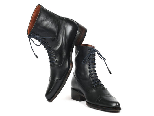 Discover the Paul Parkman Goodyear Welted Boots in black leather, made-to-order and adorned with hand-painted leather and brown soles, featuring expert craftsmanship with Goodyear welted construction.