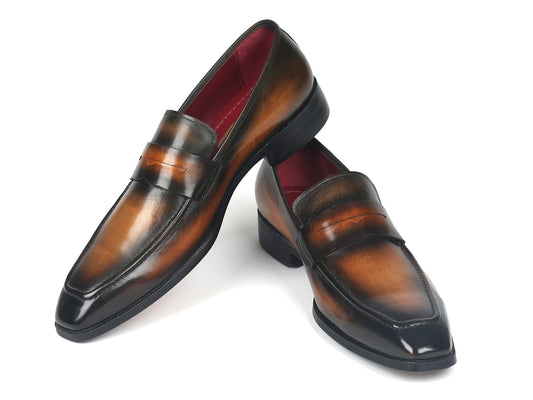 The Paul Parkman Penny Loafers Olive Brown - 10LZ24, crafted by the renowned brand Paul Parkman, display a refined elegance with their sleek design and dark toe accents. These polished olive brown leather loafers, featuring a striking red interior, are expertly made-to-order for the discerning gentleman and are elegantly positioned diagonally against a white background.