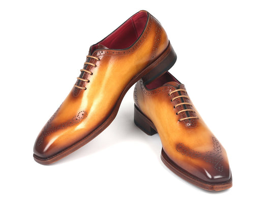A pair of Paul Parkman Goodyear Welted Punched Oxfords Camel - 7614-CML shoes, featuring elegant decorative perforations and laces, set against a white background. Crafted with Goodyear welted construction for lasting quality and style.