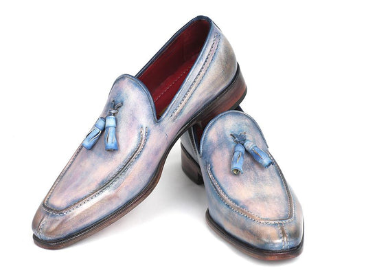 A pair of Paul Parkman Tassel Loafers Lila Hand-Painted - 083-LIL with a mesmerizing patina effect and elegant brown soles, arranged slightly overlapping on a white background.