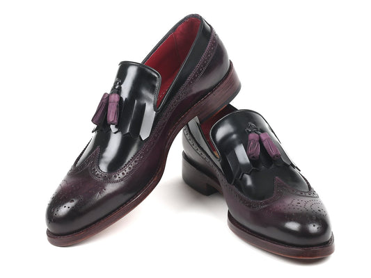 A pair of Paul Parkman Kiltie Tassel Loafers in black and purple, featuring shiny hand-painted leather with intricate brogue detailing and purple tassels, artfully placed on a white background.