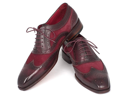 Introducing the Paul Parkman Suede & Calfskin Wingtip Oxfords Bordeaux - 228BRDSD, a pair of exquisite wingtip brogues in glossy red and burgundy, featuring intricate detailing crafted from Bordeaux suede and completed with elegant laces.