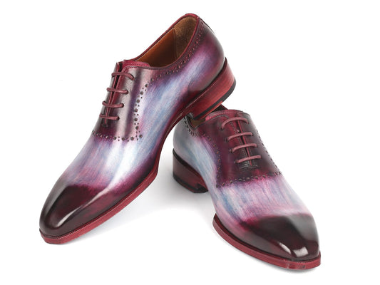 Paul Parkman introduces the Blue & Purple Oxfords (AG446PBL) for men, featuring a polished finish with a sculpted toe, gradient shades of burgundy and blue, hand-painted leather craftsmanship, laces, and decorative perforations.