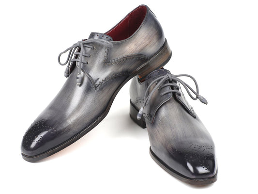 The Paul Parkman Gray Medallion Toe Derby Shoes (Model 6584-GRY) offer a distinctive look crafted from hand-burnished leather, perfect for an elegant pair of men's dress shoes.