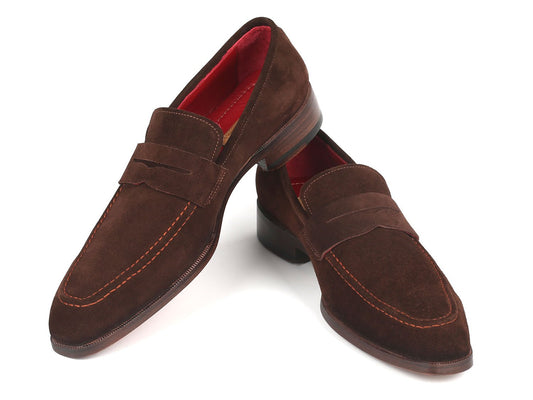 Introducing the Paul Parkman Penny Loafers in Brown Suede (10SD83), these men's slip-on shoes feature a sleek penny strap and a low heel, seamlessly blending style and comfort. They boast a striking red interior lining, making them an ideal choice for the fashion-forward man.