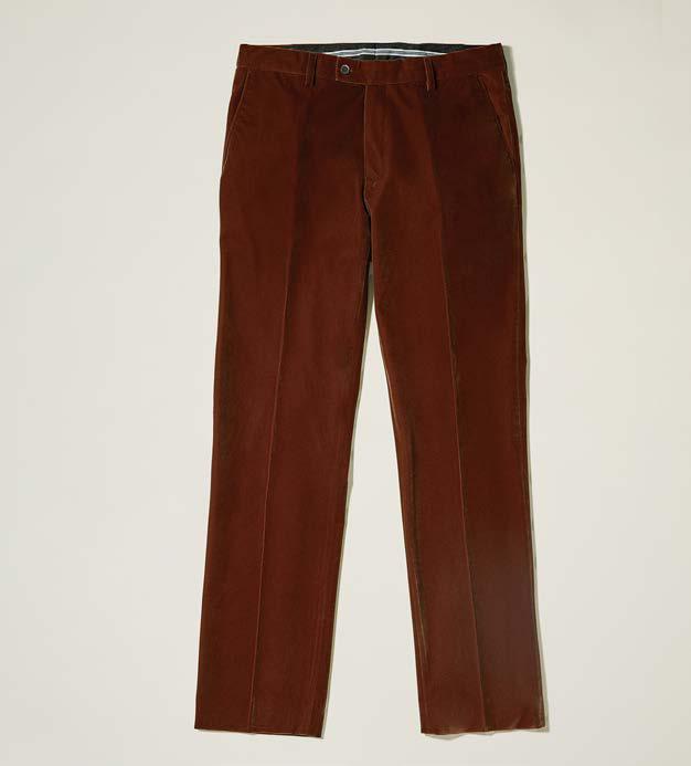 Close-up of Inserch's Aztec Velvet Pants (P502-27) in a modern fit, showcasing a visible buttoned back pocket and belt loops, laid on a neutral background.