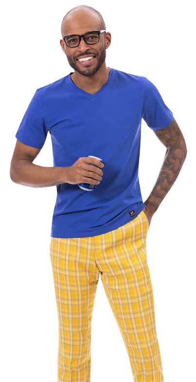 A person in a blue T-shirt and EJ Samuel Yellow Plaid Pants PL128 holds a drink can and smiles.