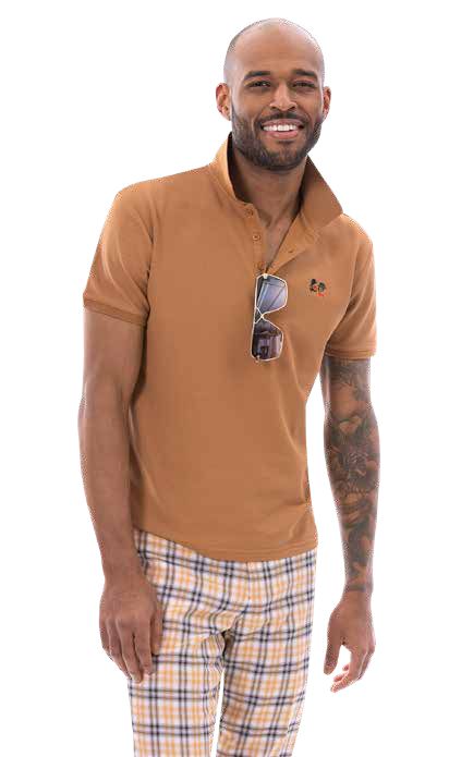 A person wearing a brown polo shirt with sunglasses hanging from the collar and stylish EJ Samuel Gold Plaid Pants PL137, standing and smiling.