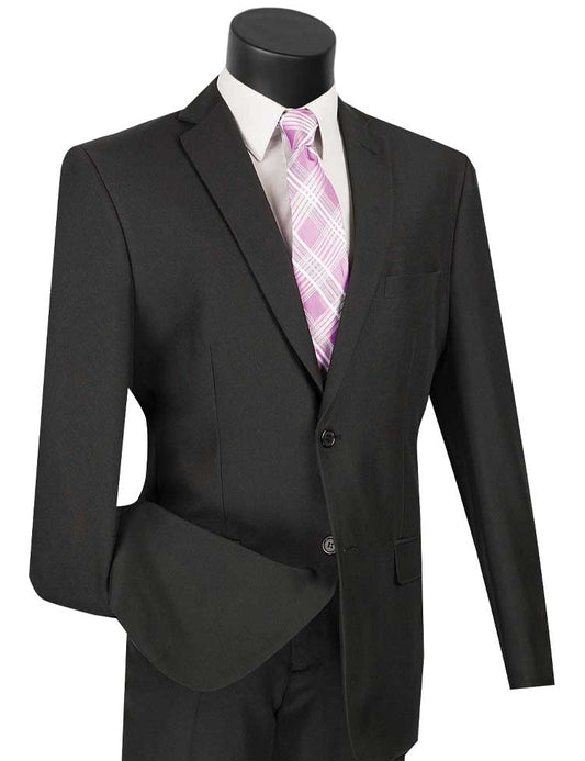 A mannequin showcases the Vinci Suits Slim Fit 2 Piece 2 Button Business Suit (Black) S-2PP, paired with a white shirt and pink plaid tie.