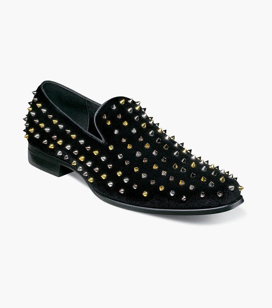 The STACY ADAMS Spire Spiked Slip On (25532-042) features a sleek black velvet design with metallic gold and silver spikes, spire spiked accents, Memory Foam cushioning, a low heel, and an easy slip-on style.