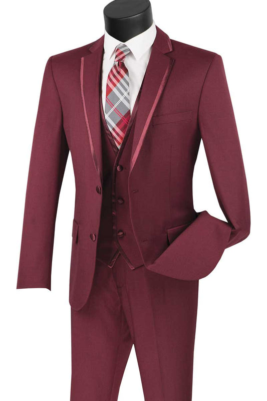 The Vinci Suits Slim Fit 2 Button 3 Piece Suit (Burgundy) SV2T-8, featuring satin lapels, is elegantly displayed on a mannequin with a crisp white shirt and plaid tie.