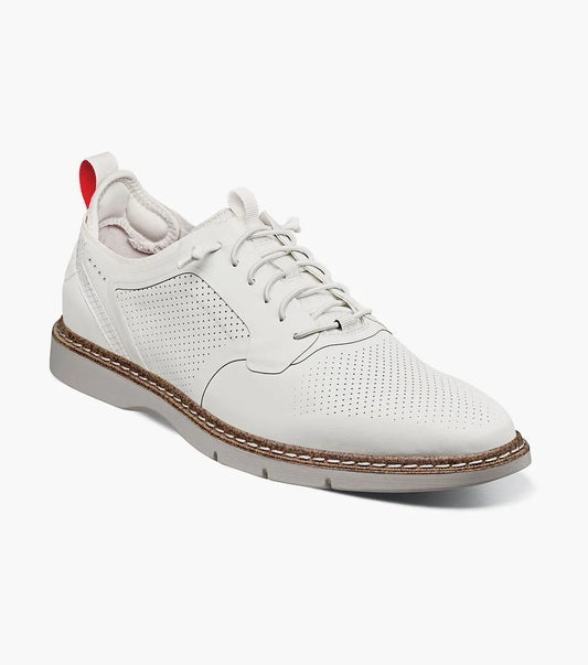 The Stacy Adams Synchro Plain Toe Elastic Lace Up in white features perforated leather, brown sole stitching, elastic laces, and a red heel pull tab for comfort.