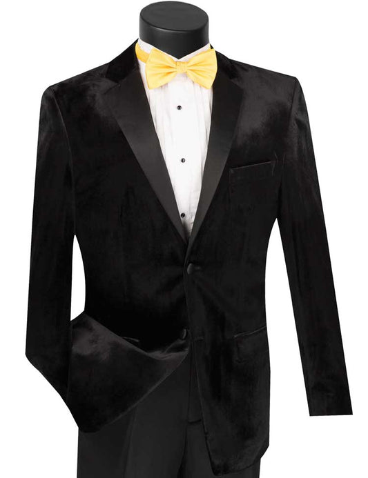 A mannequin elegantly displays the Vinci Suits Slim Fit 2 Piece Velvet Tuxedo in black, featuring shiny lapels, paired with a white dress shirt and a yellow bow tie.