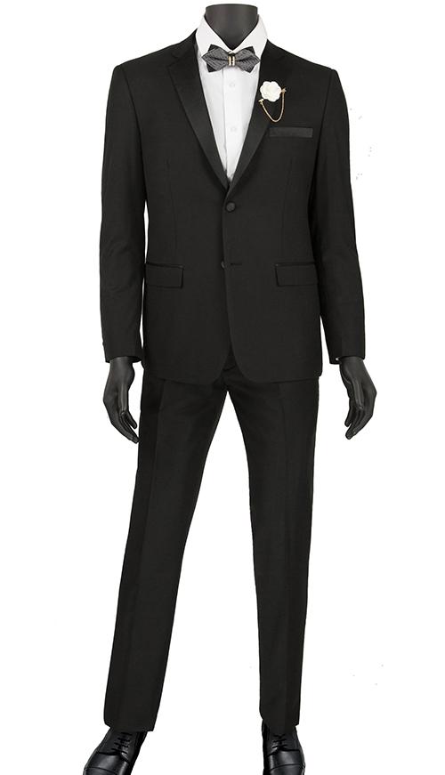 A mannequin showcases the Vinci Suits Ultra Slim Fit 2 Buttons 2 Piece Tuxedo (Black) T-US900, featuring a black suit with a white shirt, black bow tie, and a crisp white flower on the notch lapel. Its wrinkle-resistant design ensures timeless elegance.