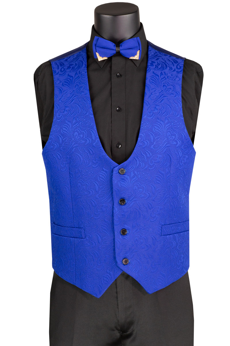 The Vinci Suits Slim Fit 3 Piece Single Button Jacquard Fabric Tuxedo (Royal) TVSJ-1 flaunts a blue patterned design with black lapels, sleek blazer, and gold-buttoned waistcoat. Paired with a black shirt, blue bow tie, and gold chain, it's elegantly showcased on a mannequin.