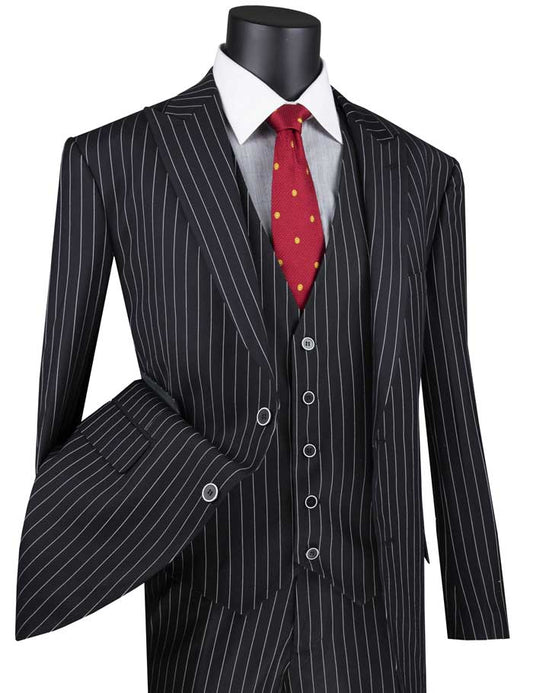 A Vinci Suits regular fit black gangster stripe three-piece suit with peak lapels, accompanied by a white shirt and red polka dot tie, is elegantly showcased on a mannequin.