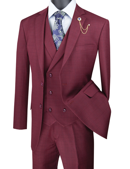 A Vinci Suits Regular Fit Glen Plaid 3 Piece Suit in Burgundy, featuring a white shirt and patterned tie, is elegantly styled with a gold chain accessory.