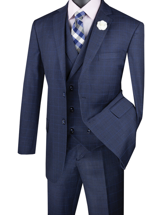 A mannequin stylishly showcases a Vinci Suits' Glen Plaid three-piece suit in navy, complete with a white lapel flower and a matching blue and white plaid tie.
