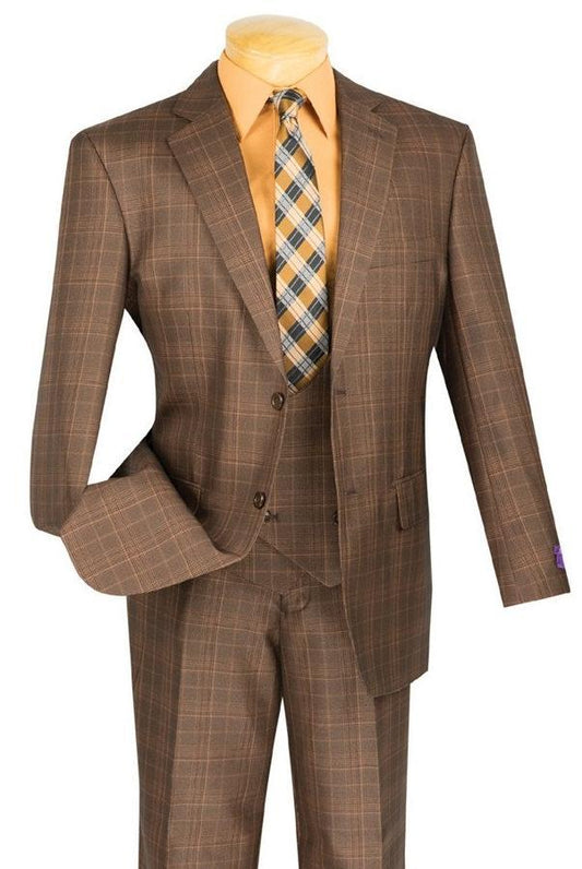 A mannequin with a wooden base displays the Vinci Suits' Regular Fit 3 Piece Suit (Chestnut) V2RW-7, featuring matching pants, a light orange shirt, and plaid tie. The double-breasted vest completes this sophisticated ensemble.