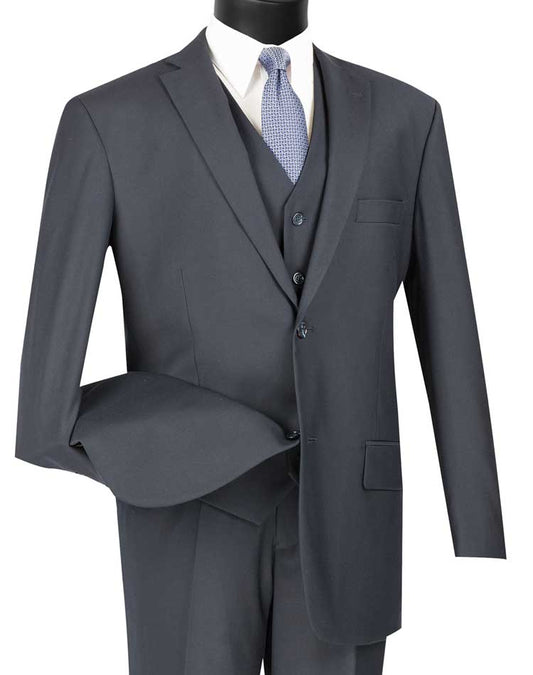 Displayed elegantly on a mannequin, the Vinci Suits Regular Fit 3 Piece Suit 2 Button (Navy) V2TR is complemented by a blue tie and crisp white shirt.