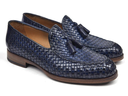 The Paul Parkman Woven Leather Tassel Loafers in Navy feature an elegant woven design with tassels adorning the front.