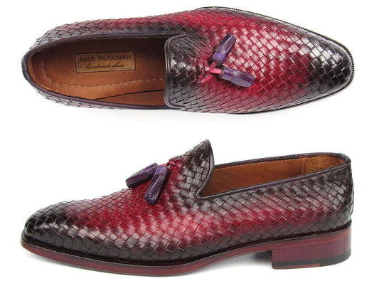 The Paul Parkman Men's Woven Leather Tassel Loafers Burgundy - WVN88-BUR feature a striking red and black gradient woven leather upper, adorned with purple tassels and complemented by a brown sole.