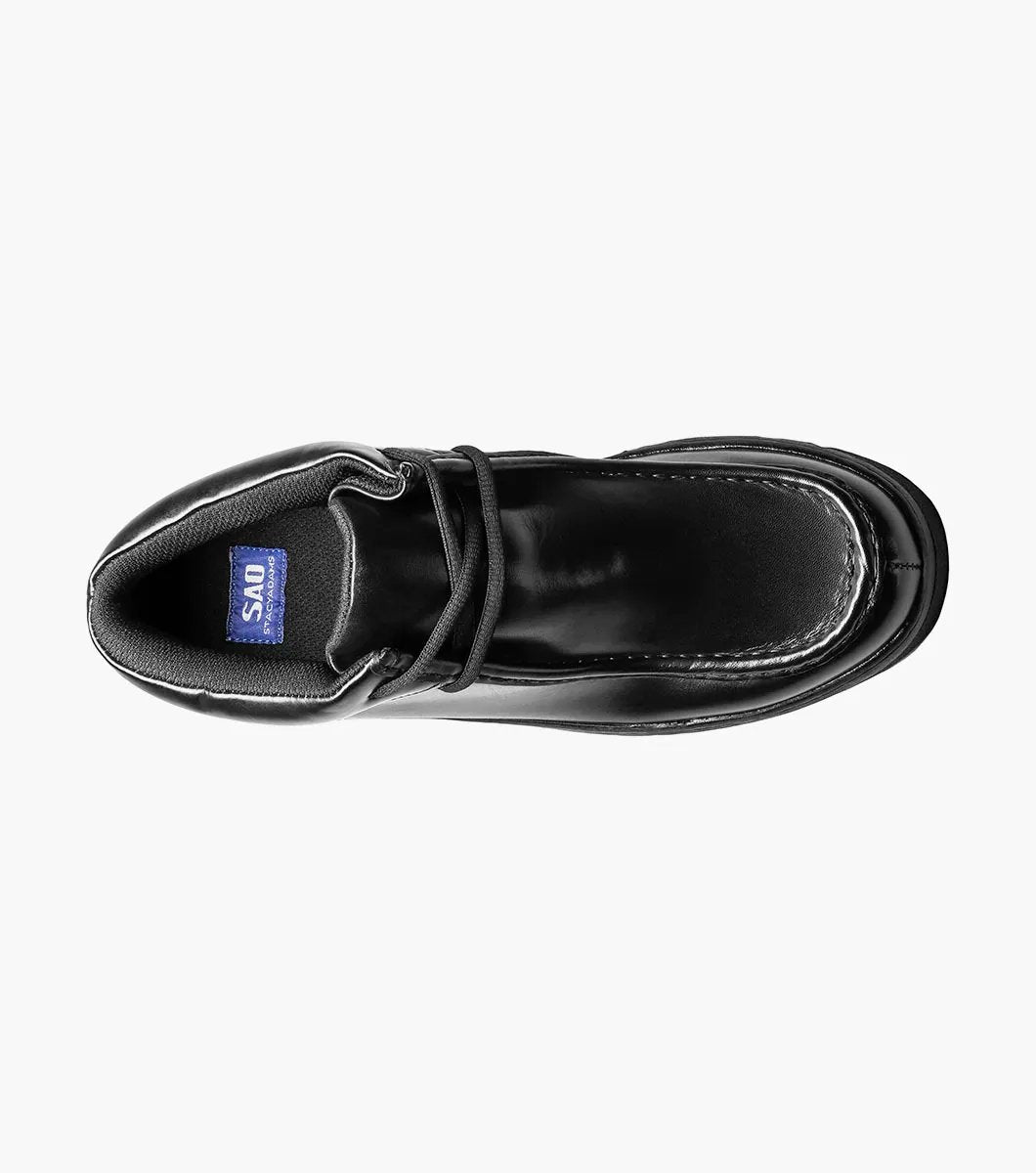 The STACY ADAMS Dublin II Moc Toe Boot (Black Smooth, 63169-57) features a lace-up design, thick textured sole, and classic moc toe style, shown here against a plain white background.