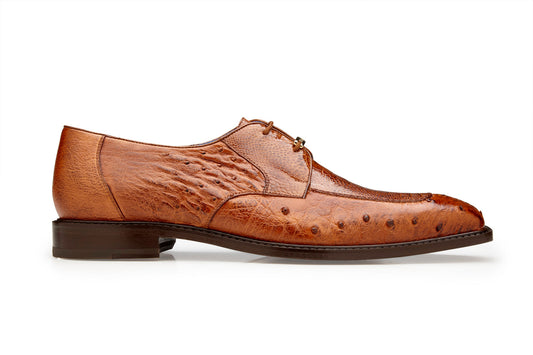Side view of the BELVEDERE Bolero dress shoe featuring genuine ostrich leg and quill in an antique almond shade, lace-up design, dark sole, on a white background.
