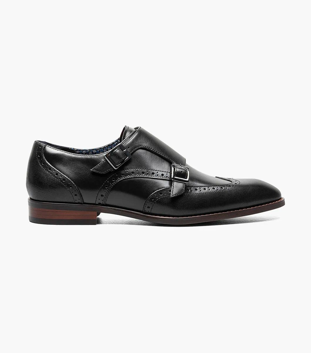 The Stacy Adams KARSON Wingtip Double Monk Strap - Black (model 25570-001) showcases a sophisticated black leather dress shoe with brogue detailing, set against a white background, crafted from premium leather.