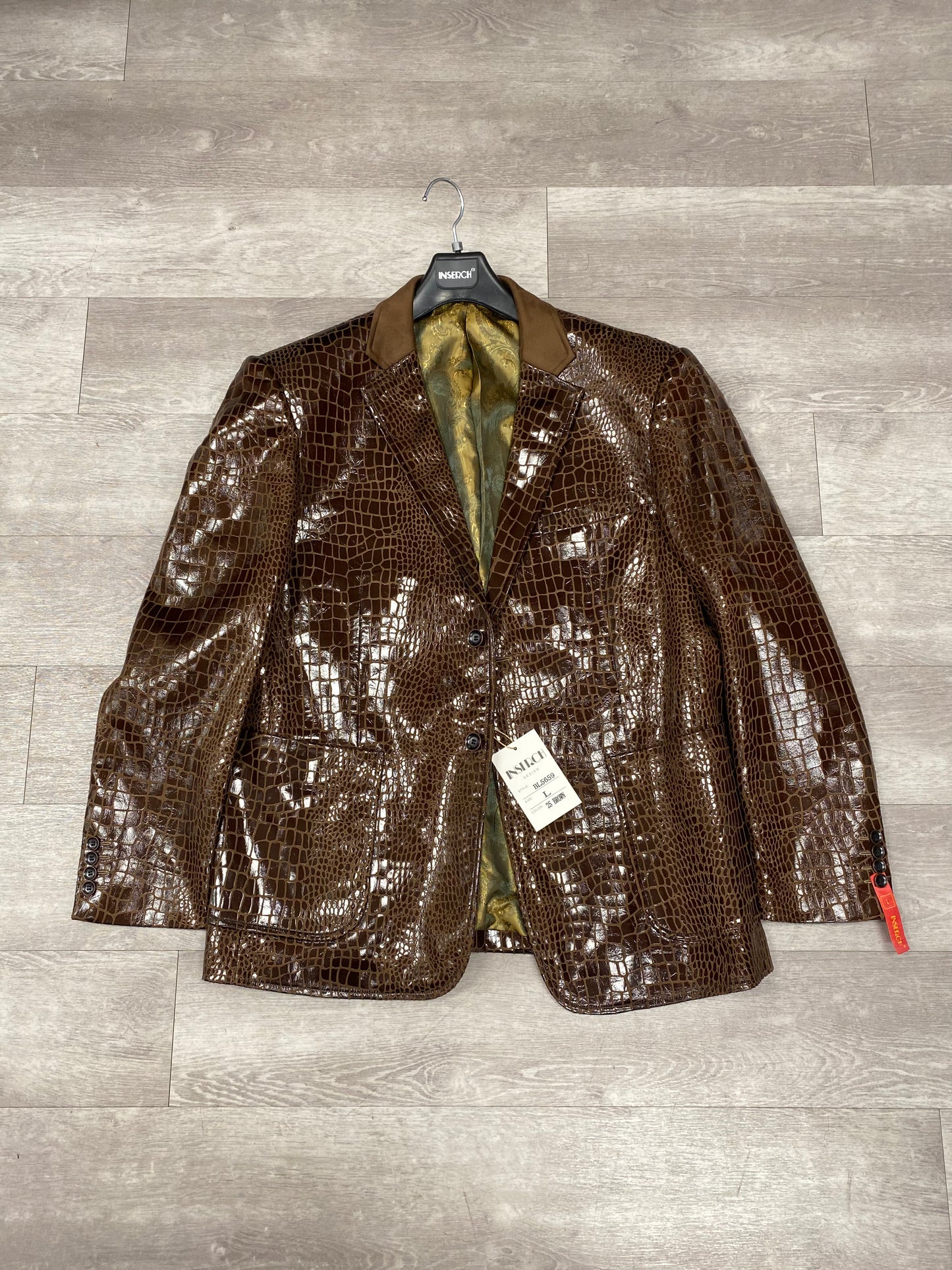 The Inserch Alligator Print Combo Blazer BL5659-25 in brown (size 3XL only, FINAL SALE) features crocodile-patterned fabric and a suede trim velvet collar. Displayed on a hanger with tags against a wood floor.