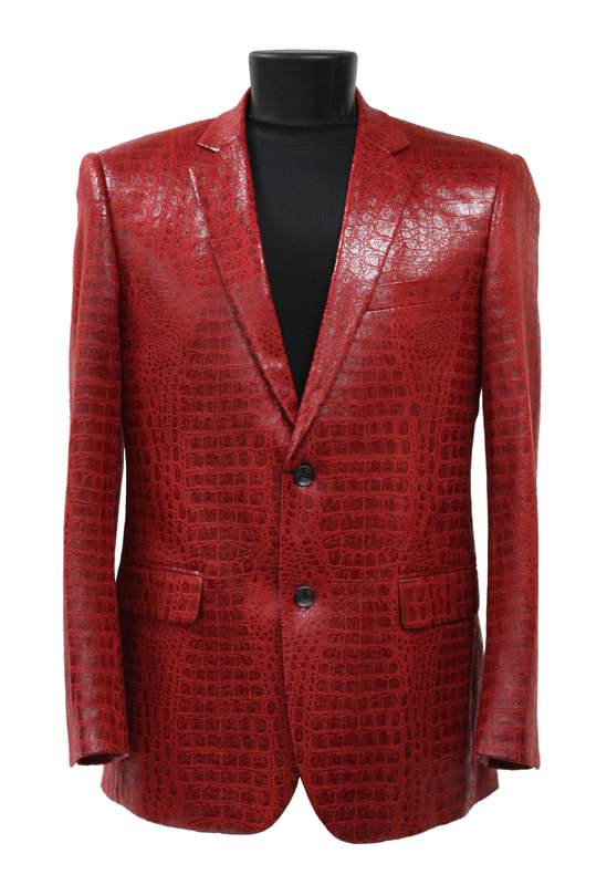 The Bassiri Blazer J1041-Red, featuring a stunning red crocodile pattern, is beautifully displayed on a black mannequin, capturing the essence of Bassiri's distinctive style.